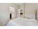 The bedroom leads to a bathroom and other living areas in the house at 6674 Cobble Bliss St, Zephyrhills, FL 33541
