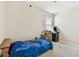 Bedroom features a blue Spiderman comforter and a game console at 6674 Cobble Bliss St, Zephyrhills, FL 33541