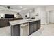 Kitchen island with view of living room at 6674 Cobble Bliss St, Zephyrhills, FL 33541