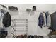 Well-organized closet with ample shelving, hanging space, and shoe racks at 6674 Cobble Bliss St, Zephyrhills, FL 33541