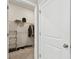 Organized walk-in closet with shelving, hanging racks, and shoe storage at 6674 Cobble Bliss St, Zephyrhills, FL 33541