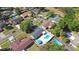 Aerial view showcasing the neighborhood with many homes and backyard pools at 706 Caliente Dr, Brandon, FL 33511
