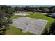 An aerial shot shows the community's basketball courts and lush surrounding greenery at 706 Caliente Dr, Brandon, FL 33511