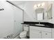 Bathroom featuring modern vanity, shower, and tile accents at 706 Caliente Dr, Brandon, FL 33511