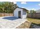 A cabana sits adjacent to a paved backyard at 706 Caliente Dr, Brandon, FL 33511