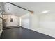 Two car garage with painted floor and access to utility closet at 706 Caliente Dr, Brandon, FL 33511