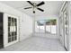 Bright sunroom with windows and access to backyard area at 706 Caliente Dr, Brandon, FL 33511