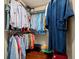 Walk-in closet contains racks and hanging rods for clothing storage at 775 Brittany Park Blvd, Tarpon Springs, FL 34689
