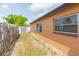 Spacious backyard with privacy fence, storage shed, and ample space for gardening or recreation at 8215 Hixton Dr, Port Richey, FL 34668