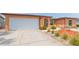 Charming home featuring a two-car garage and mature landscaping at 8215 Hixton Dr, Port Richey, FL 34668
