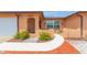 Charming single-story home with well-manicured landscaping, a driveway, and a welcoming entrance at 8215 Hixton Dr, Port Richey, FL 34668