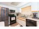 Well-equipped kitchen features stainless steel appliances and ample counter space at 8215 Hixton Dr, Port Richey, FL 34668