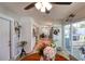 Open dining area that leads to kitchen and outdoor patio at 8326 Archwood Cir, Tampa, FL 33615