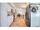 Bright kitchen with stainless steel appliances and views to dining space at 8326 Archwood Cir, Tampa, FL 33615