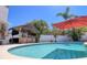 Inviting pool with outdoor tiki bar, perfect for entertaining and relaxation at 8326 Archwood Cir, Tampa, FL 33615