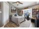 Cozy bedroom with a double bed, desk, and closet at 8403 Southwood Pines St, Lithia, FL 33547