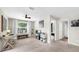 Versatile bonus room with ample natural light and neutral carpet, perfect for various activities at 934 Grand Canyon Dr, Valrico, FL 33594