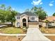 Charming two-story home featuring manicured landscaping and a spacious two car driveway at 934 Grand Canyon Dr, Valrico, FL 33594