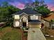 Charming two-story home featuring manicured landscaping and a spacious two car driveway at 934 Grand Canyon Dr, Valrico, FL 33594
