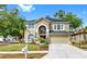 Charming two-story home with a well-manicured lawn, a two-car garage, and classic American curb appeal at 934 Grand Canyon Dr, Valrico, FL 33594