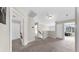 The hallway features neutral walls, carpet floors, several doors, and access to multiple rooms at 934 Grand Canyon Dr, Valrico, FL 33594
