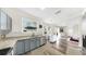 Charming kitchen with gray cabinets, stainless appliances and granite countertops at 934 Grand Canyon Dr, Valrico, FL 33594