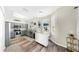 Bright kitchen features gray cabinets, stainless appliances, and a butcher block island at 934 Grand Canyon Dr, Valrico, FL 33594
