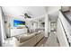 Spacious living room with a modern sectional sofa and open view to the dining area at 934 Grand Canyon Dr, Valrico, FL 33594