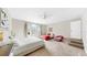 Spacious bedroom featuring multiple beds, neutral decor, and lots of natural light at 934 Grand Canyon Dr, Valrico, FL 33594