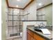 Updated bathroom featuring glass enclosed shower at 10 James Ct, Oldsmar, FL 34677