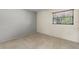 Empty bedroom with neutral carpeting and great natural light at 10 James Ct, Oldsmar, FL 34677