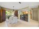 Bright dining area open to the kitchen with access to outdoor patio at 10 James Ct, Oldsmar, FL 34677