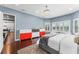 Bedroom with large bay windows and a view of the kitchen at 10007 Hazelnut Ct, Tampa, FL 33647