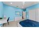 Inviting bedroom boasts recessed lighting, modern chandelier, and a decorative wall mirror at 10007 Hazelnut Ct, Tampa, FL 33647