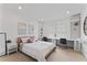 Bedroom with white walls, neutral carpeting, and two built-in desk areas at 10007 Hazelnut Ct, Tampa, FL 33647
