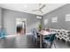 Dining room featuring views to both the kitchen and the outdoors at 10007 Hazelnut Ct, Tampa, FL 33647