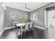 Contemporary dining room with modern decor and an open layout, perfect for gatherings at 10007 Hazelnut Ct, Tampa, FL 33647