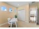 Office features include neutral carpeting, natural light, closet, and white trim at 10007 Hazelnut Ct, Tampa, FL 33647