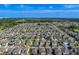 Wide aerial shot showing the overall neighborhood layout, property sizes, and community design at 10222 Cool Waterlily Ave, Riverview, FL 33578