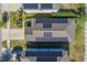 Birds eye view of a house with solar panels installed on the roof at 10222 Cool Waterlily Ave, Riverview, FL 33578