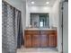 Bathroom featuring double vanity, granite countertops, and tile flooring at 10222 Cool Waterlily Ave, Riverview, FL 33578