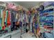 Walk-in closet providing ample storage for clothes, shoes, and accessories at 10222 Cool Waterlily Ave, Riverview, FL 33578