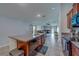 Open concept kitchen with a large island, stainless steel dishwasher, and ample cabinet space at 10222 Cool Waterlily Ave, Riverview, FL 33578