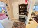 Cozy hallway with artwork and a decorative chest at 103 1St St, Belleair Beach, FL 33786