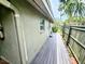 A house exterior with a wooden deck at 103 1St St, Belleair Beach, FL 33786