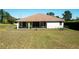 Spacious backyard with fenced-in yard at 10400 Golden Ave, Weeki Wachee, FL 34613