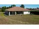 Spacious backyard with fenced-in yard at 10400 Golden Ave, Weeki Wachee, FL 34613