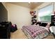 Cozy bedroom with carpet, decorative pillows and natural light from the window at 10400 Golden Ave, Weeki Wachee, FL 34613