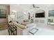 Spacious living room features modern furniture, neutral decor, and an open layout at 10608 Gretna Green Dr, Tampa, FL 33626