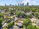 Beautiful home with lush landscaping highlighted by a downtown skyline view at 1115 Crescent Lake N Dr, St Petersburg, FL 33701